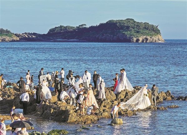 寻钱网 用点滴行动传递“大连式浪漫”让城市的热情流淌到每一位客人心间